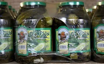 фотография продукта Огурцы в заливке с зеленью